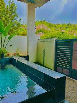 Pool view with banana plants and Nandi Hills backdrop